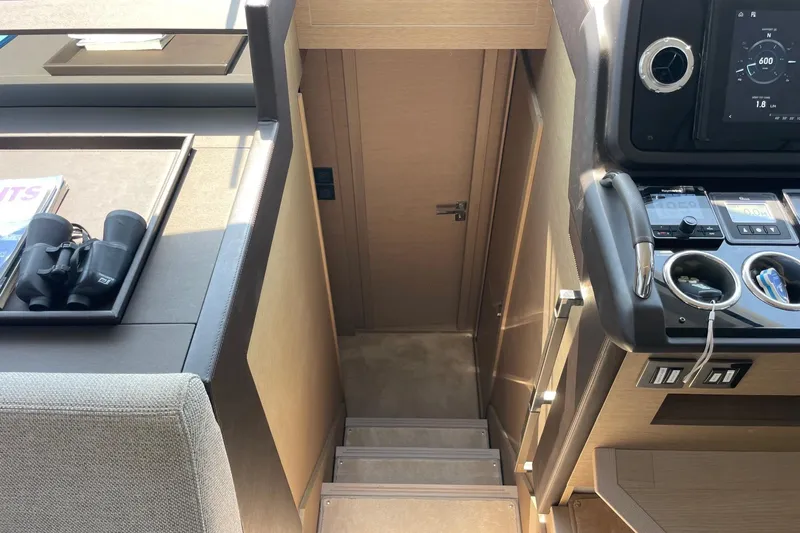  Yacht Photos Pics Interior of 2021 Prestige 460 yacht, featuring helm controls and navigation equipment.