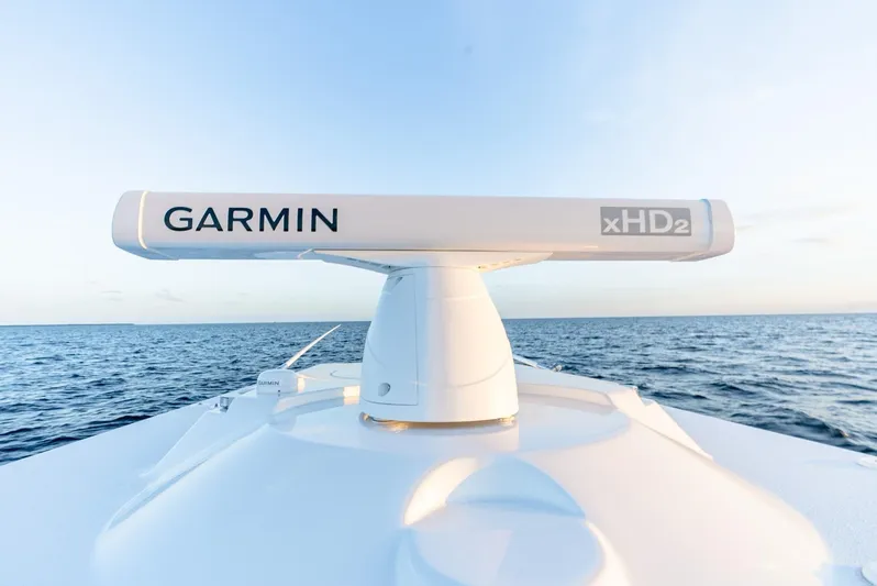  Yacht Photos Pics Garmin xHD2 radar on 2023 Yellowfin 34 Offshore boat, ocean background.