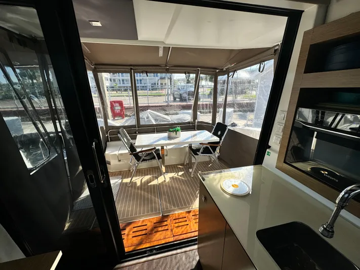 King's Ransom Yacht Photos Pics Interior view of 2017 Fountaine Pajot MY 37 yacht, featuring a cozy dining area.