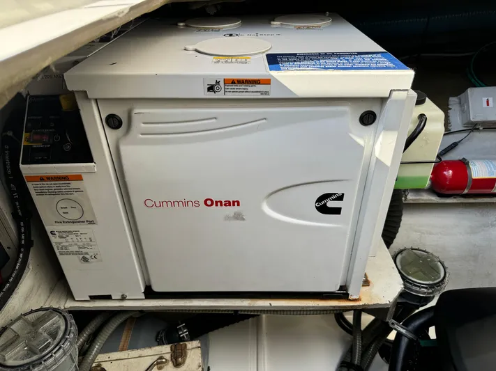 King's Ransom Yacht Photos Pics Cummins Onan generator in 2017 Fountaine Pajot MY 37 yacht engine room.