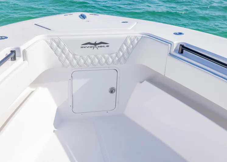  Yacht Photos Pics 2025 Invincible 36 Open Fisherman boat interior with sleek design and storage compartment.