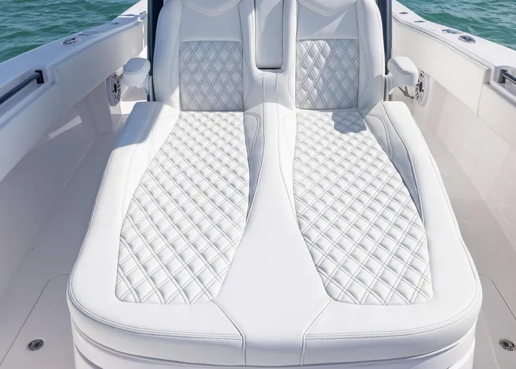  Yacht Photos Pics Luxurious seating on 2025 Invincible 36 Open Fisherman boat with diamond-stitched upholstery.