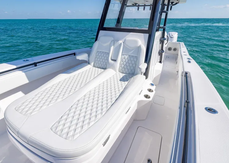  Yacht Photos Pics 2025 Invincible 36 Open Fisherman boat with luxurious seating on open water.