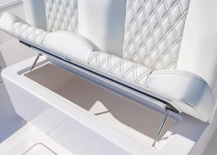  Yacht Photos Pics 2025 Invincible 36 Open Fisherman boat seat with diamond stitching and storage compartment.