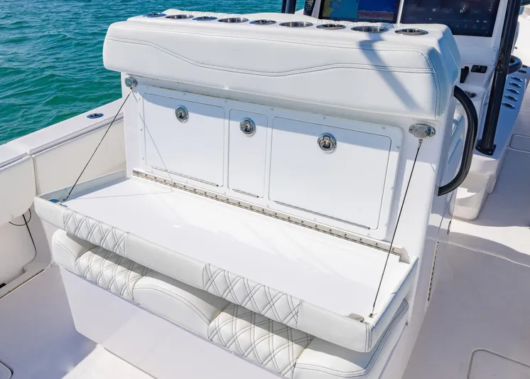  Yacht Photos Pics 2025 Invincible 36 Open Fisherman boat with white seating and storage compartments.