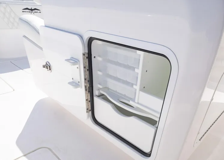  Yacht Photos Pics Open storage compartment on 2025 Invincible 36 Open Fisherman boat.