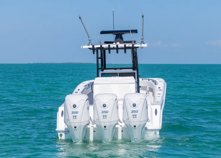  Yacht Photos Pics 2025 Invincible 36 Open Fisherman boat with triple 350 V8 engines on the ocean.