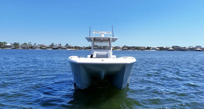 Engine Warranty X Trailer Yacht Photos Pics 2020 Invincible 37 Catamaran on calm water, clear sky, coastal background.