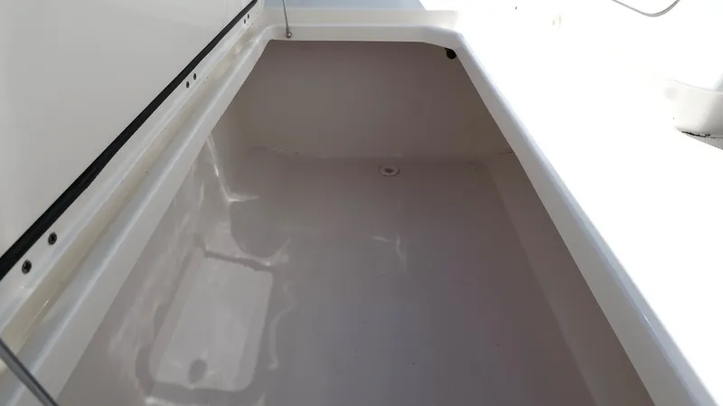 Engine Warranty X Trailer Yacht Photos Pics Storage compartment of 2020 Invincible 37 Catamaran, featuring a spacious interior.