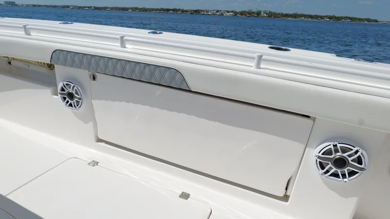 Engine Warranty X Trailer Yacht Photos Pics 2020 Invincible 37 Catamaran deck with speakers, ocean view in background.