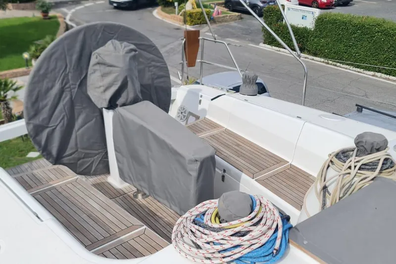  Yacht Photos Pics 2010 Hanse 400e yacht deck with covered equipment and coiled ropes.