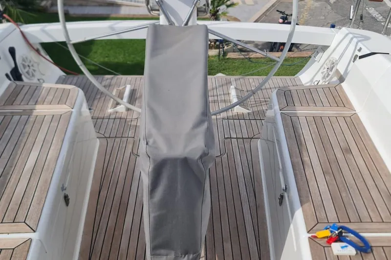  Yacht Photos Pics 2010 Hanse 400e yacht cockpit with teak flooring and covered steering wheel.