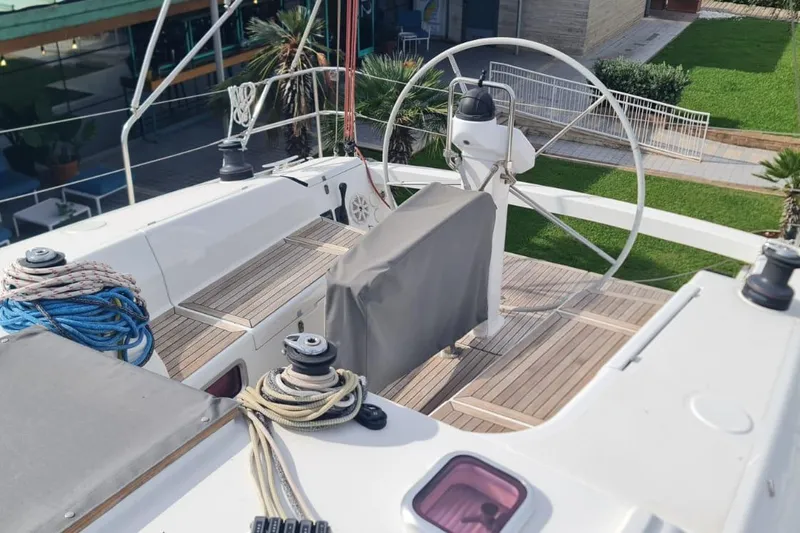  Yacht Photos Pics 2010 Hanse 400e yacht deck with steering wheel and ropes.