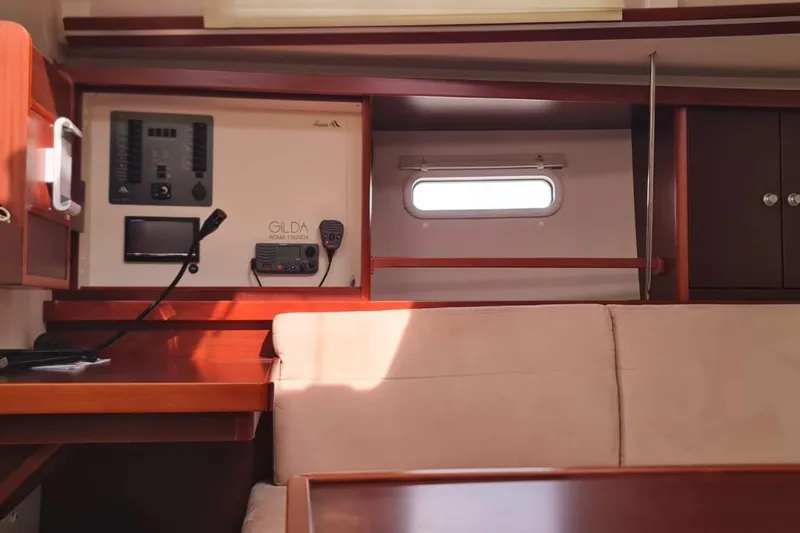  Yacht Photos Pics Interior of 2010 Hanse 400e yacht with control panel and seating area.