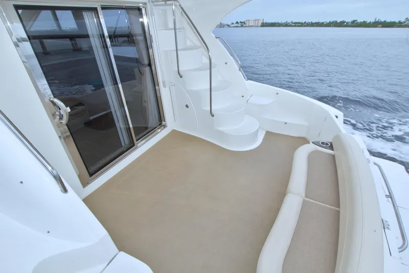 Why Knot Yacht Photos Pics 2013 Meridian 441 Sedan yacht deck with seating and ocean view.