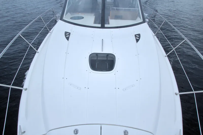 Why Knot Yacht Photos Pics 2013 Meridian 441 Sedan yacht on water, top deck view.