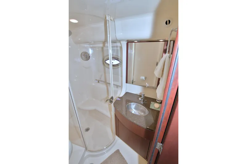 Why Knot Yacht Photos Pics Luxurious bathroom in 2013 Meridian 441 Sedan yacht with shower and sink.