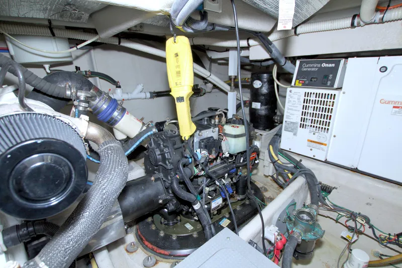 Why Knot Yacht Photos Pics Engine room of 2013 Meridian 441 Sedan with Cummins Onan generator.