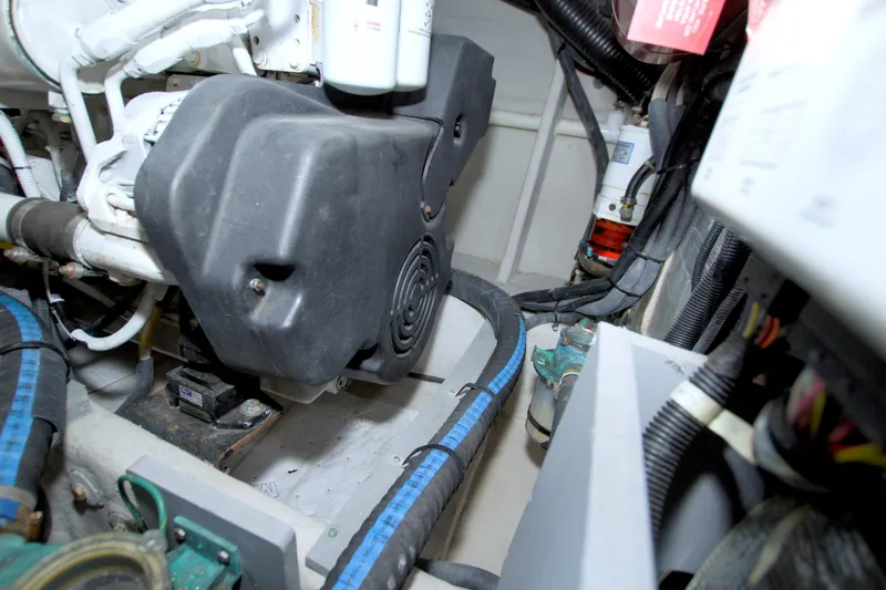 Why Knot Yacht Photos Pics Engine room of 2013 Meridian 441 Sedan with visible components and wiring.