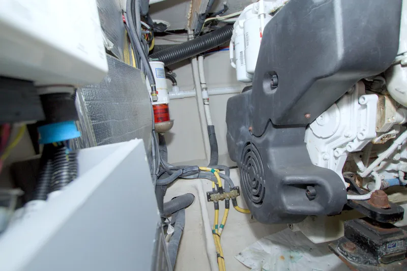 Why Knot Yacht Photos Pics Engine room of 2013 Meridian 441 Sedan with visible components and wiring.