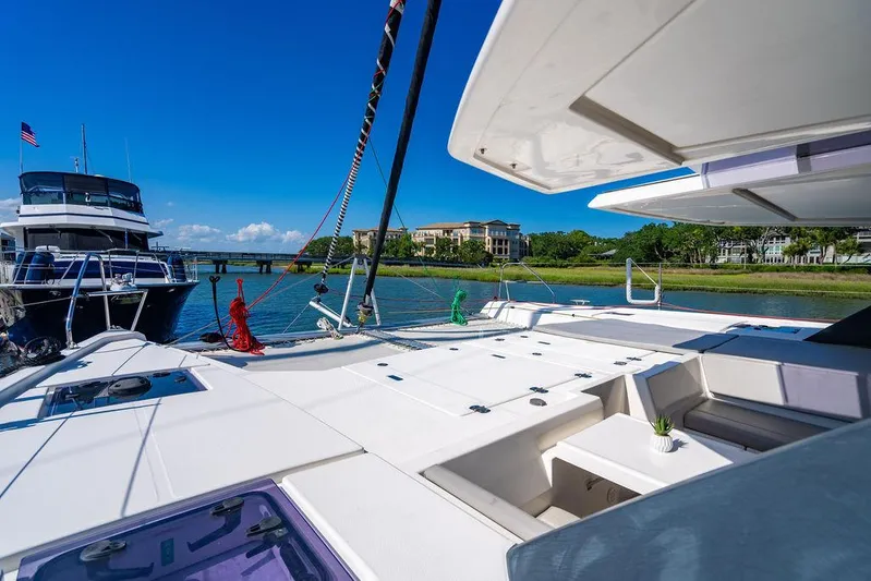 Scooby Yacht Photos Pics Luxury Leopard 50 yacht deck with scenic waterfront view, 2022 model.