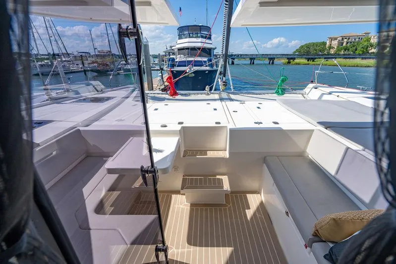 Scooby Yacht Photos Pics Leopard 50 catamaran interior, 2022 model, docked with scenic marina view.