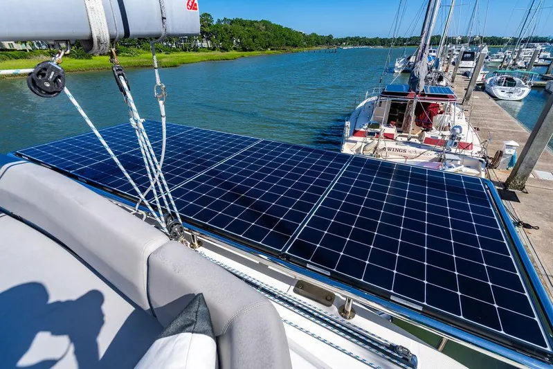 Scooby Yacht Photos Pics Leopard 50 yacht with solar panels docked at marina, 2022 model.