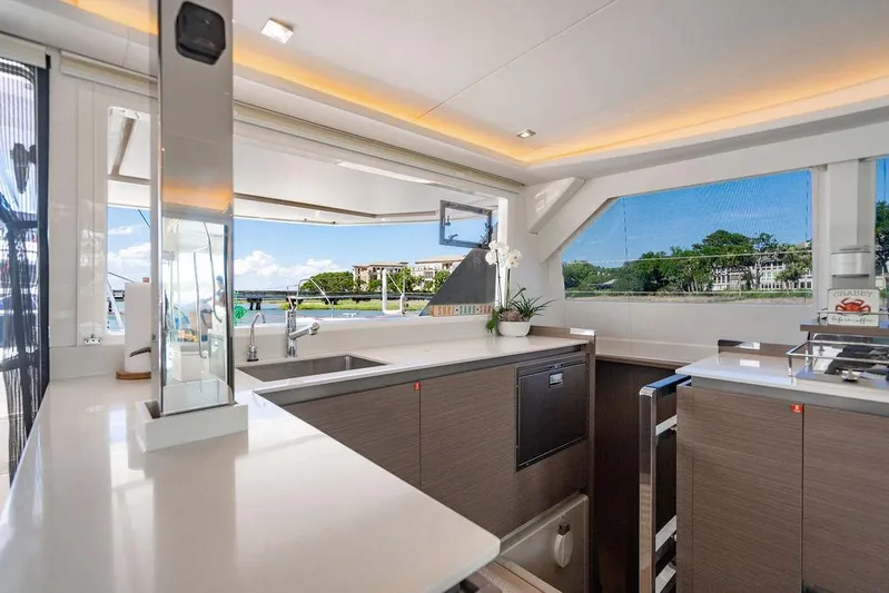 Scooby Yacht Photos Pics Luxurious kitchen interior on a 2022 Leopard 50 yacht, featuring modern design and scenic views.