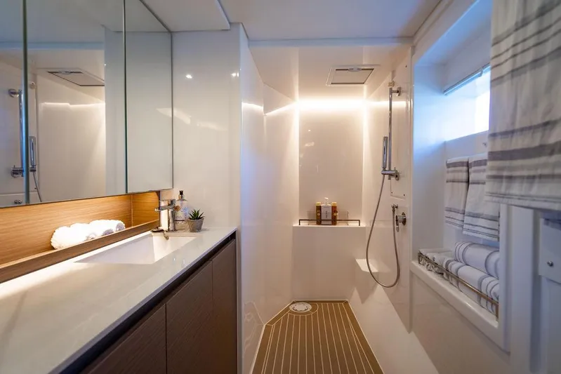 Scooby Yacht Photos Pics Luxurious yacht bathroom with modern fixtures, elegant lighting, and sleek design, Leopard 50, 2022 model.