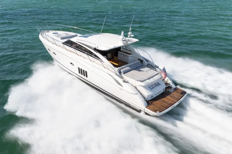 Luna Yacht Photos Pics Luxury 2009 Princess V62 yacht cruising on open water.