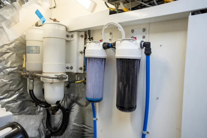 Luna Yacht Photos Pics Engine room of 2009 Princess V62 yacht with water filtration system.