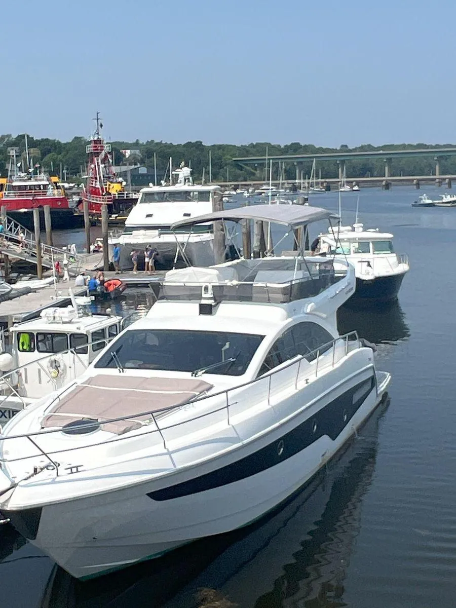 Luxury Schaefer 510 yacht docked at marina, 2019 model.