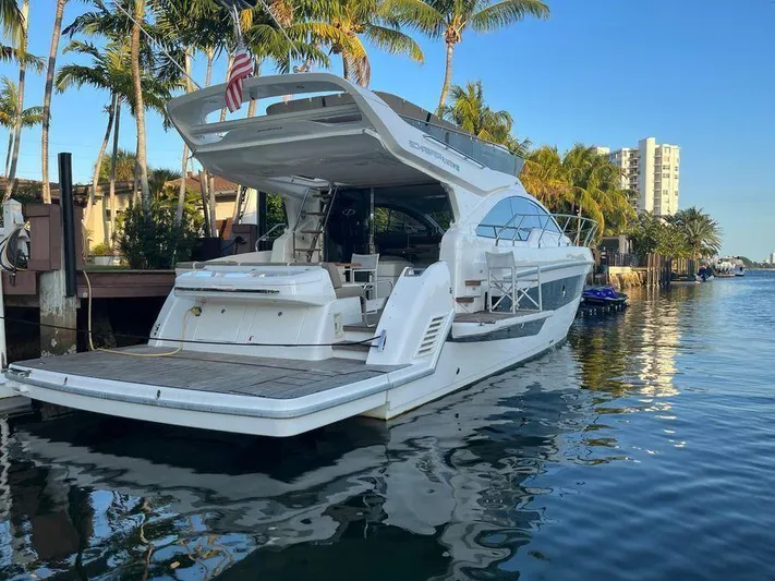 510 Schaefer Yacht Photos Pics Luxury Schaefer 510 yacht docked by palm trees, 2019 model.