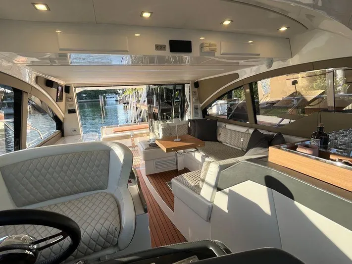 510 Schaefer Yacht Photos Pics Luxurious interior of a 2019 Schaefer 510 yacht with elegant seating and modern design.