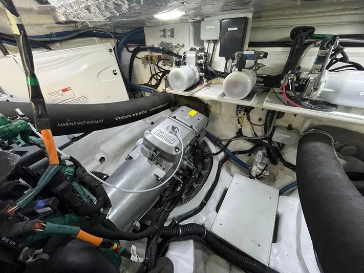 510 Schaefer Yacht Photos Pics Engine room of a 2019 Schaefer 510 yacht, featuring Volvo Penta components and marine wet exhaust.
