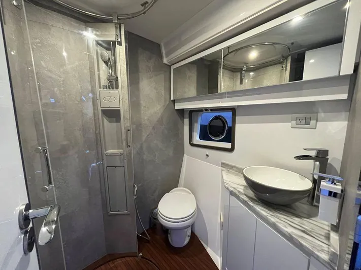 510 Schaefer Yacht Photos Pics Modern bathroom in 2019 Schaefer 510 yacht with shower, toilet, and stylish sink.