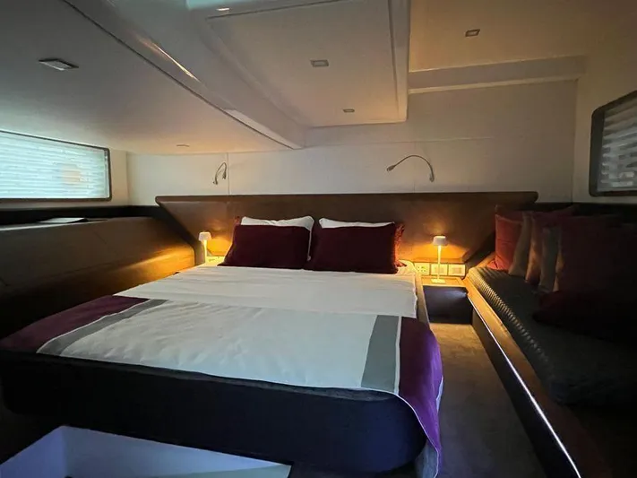 510 Schaefer Yacht Photos Pics Luxurious cabin interior of 2019 Schaefer 510 yacht with cozy bed and ambient lighting.