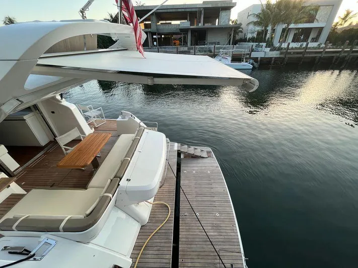 510 Schaefer Yacht Photos Pics Luxury Schaefer 510 yacht, 2019 model, docked by waterfront with elegant seating area.