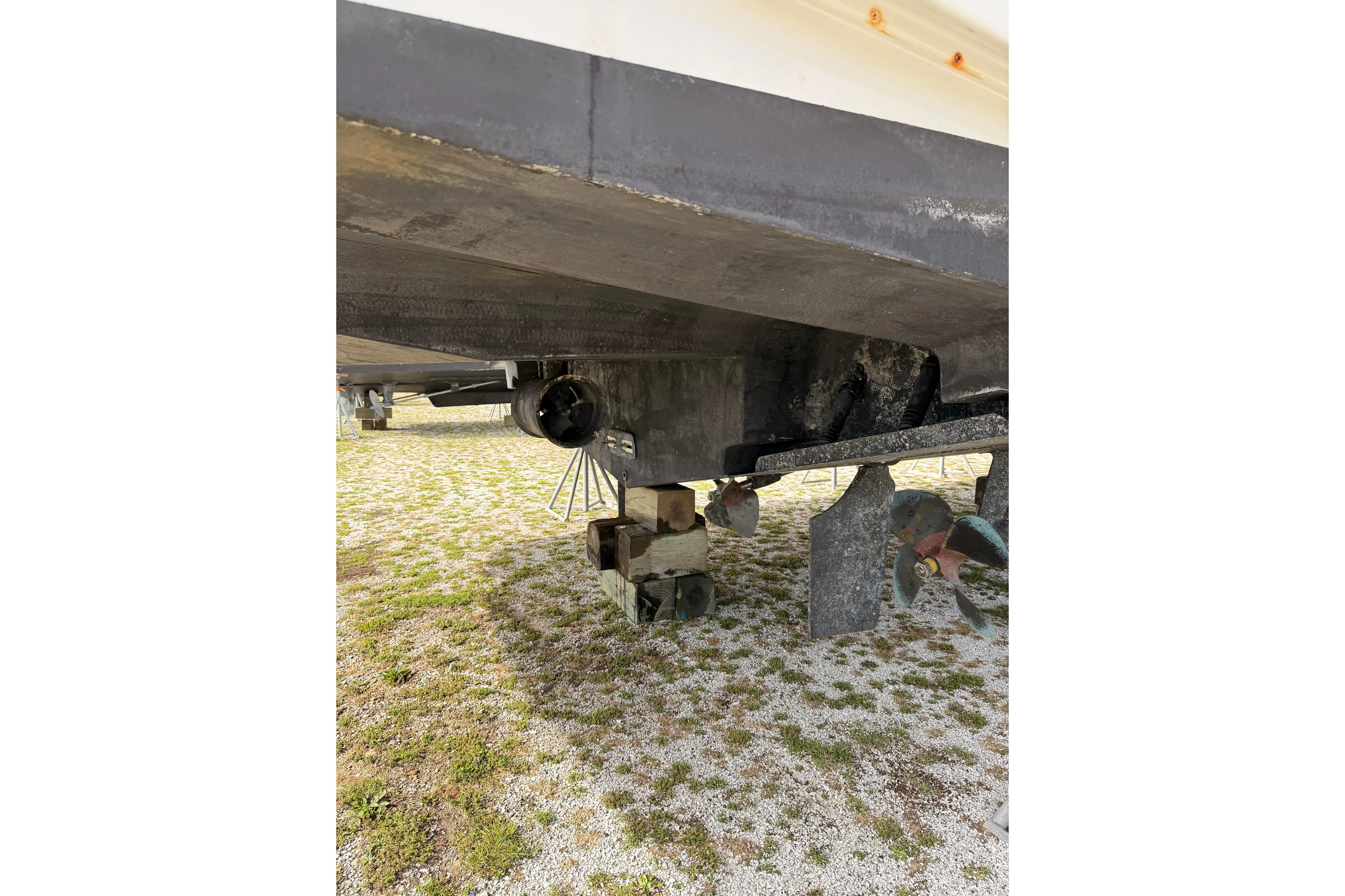  Yacht Photos Pics Underside view of a 2003 Carver 564 Cockpit Motor Yacht on blocks.