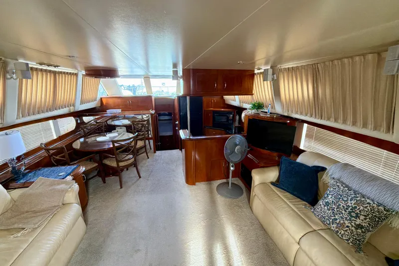  Yacht Photos Pics Luxurious interior of 2003 Carver 564 Cockpit Motor Yacht with elegant furnishings.