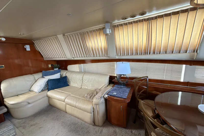  Yacht Photos Pics Luxurious interior of 2003 Carver 564 Cockpit Motor Yacht with leather seating and elegant decor.