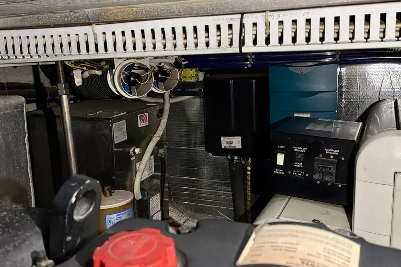  Yacht Photos Pics Engine room of 2003 Carver 564 Cockpit Motor Yacht with electrical components and wiring.