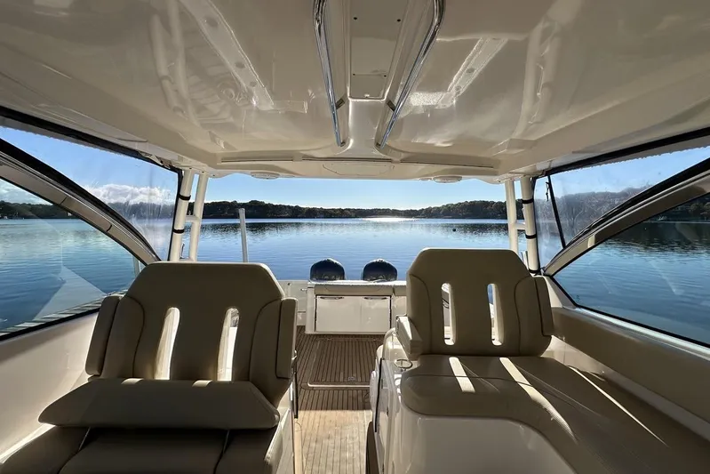 Soul Mates Yacht Photos Pics 2016 Pursuit DC 325 Dual Console boat interior with lake view.