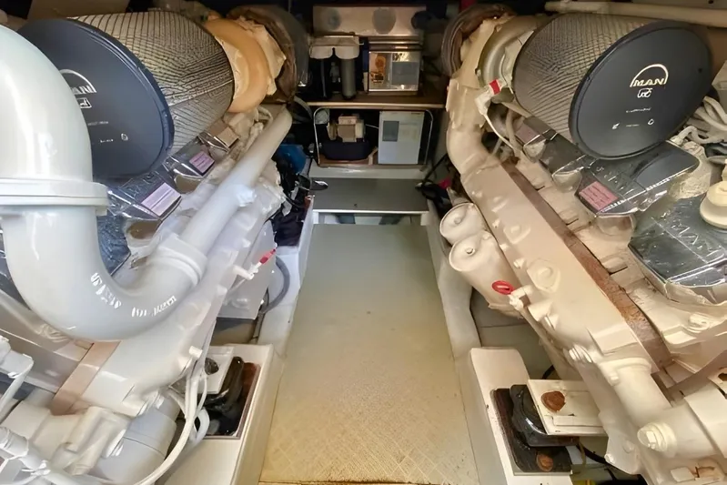  Yacht Photos Pics Engine room of a 2005 Ferretti Yachts 550, featuring dual MAN engines.