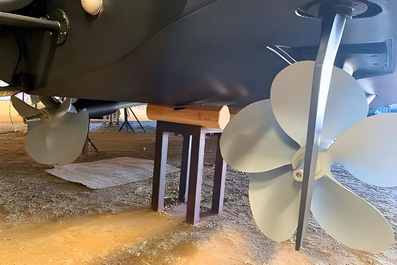  Yacht Photos Pics Propellers of a 2005 Ferretti Yachts 550 on dry dock for maintenance.