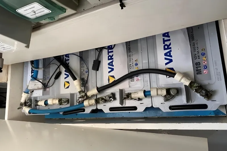  Yacht Photos Pics Battery compartment of a 2005 Ferretti Yachts 550 with Varta batteries and wiring.