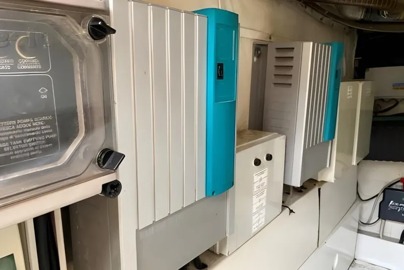  Yacht Photos Pics Electrical panel on a 2005 Ferretti Yachts 550, featuring various control units.