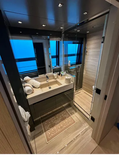 Saam II Yacht Photos Pics Luxurious bathroom in 2024 Sanlorenzo SL96 yacht with modern fixtures and ocean view.