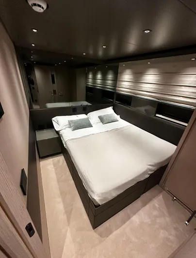 Saam II Yacht Photos Pics Luxurious bedroom interior of 2024 Sanlorenzo SL96 yacht with modern design and ambient lighting.