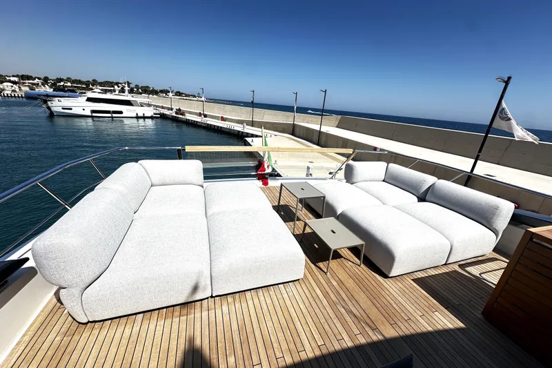 Saam II Yacht Photos Pics Luxurious 2024 Sanlorenzo SL96 yacht deck with modern seating and ocean view.